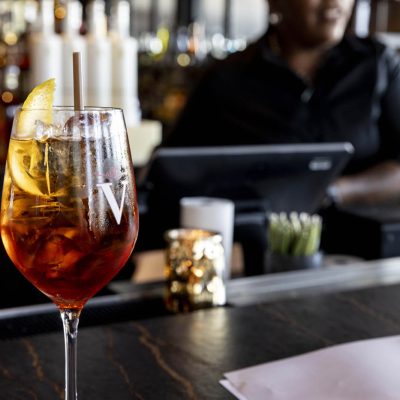 Close up of wine cocktail on bar at Valentina's restaurant in Dublin, Ohio at Bridge Park.