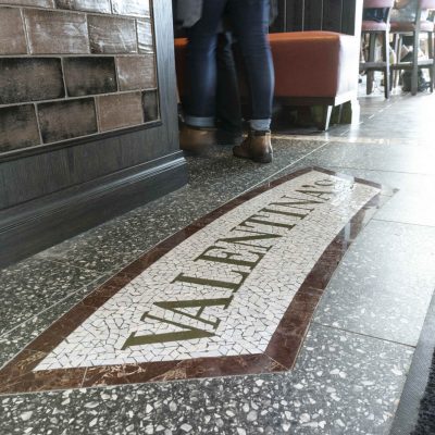 Close-up of the inlaid marble and tile Valentina's entry at Valentina's restaurant in Dublin, Ohio at Bridge Park.