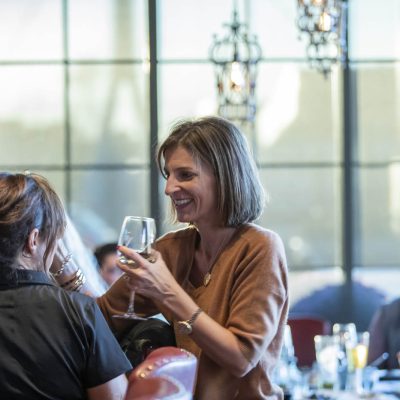 Two guests sit at the bar at Valentina's Italian