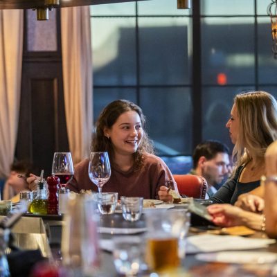 Two guests sit at the bar at Valentina's Italian