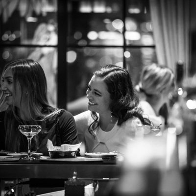 Two guests sit at the bar at Valentina's Italian