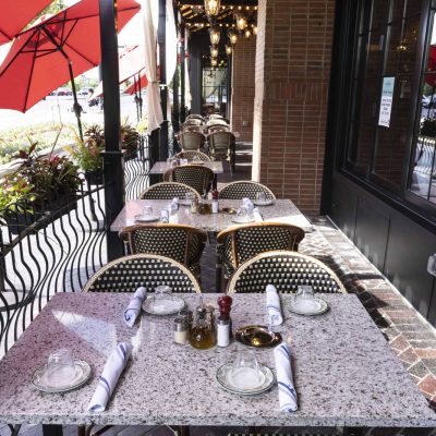 Patio tables set for service at Valentina's restaurant at Bridge Park in Dublin, Ohio.