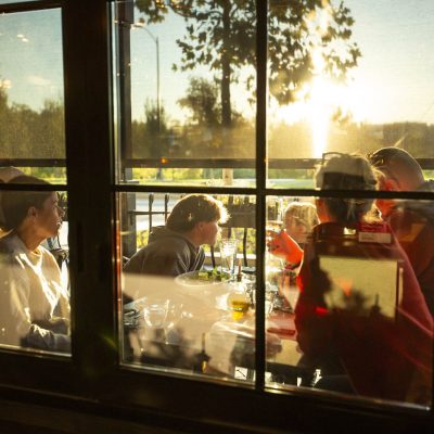 View of Valentina's outdoor patio through a dining room window