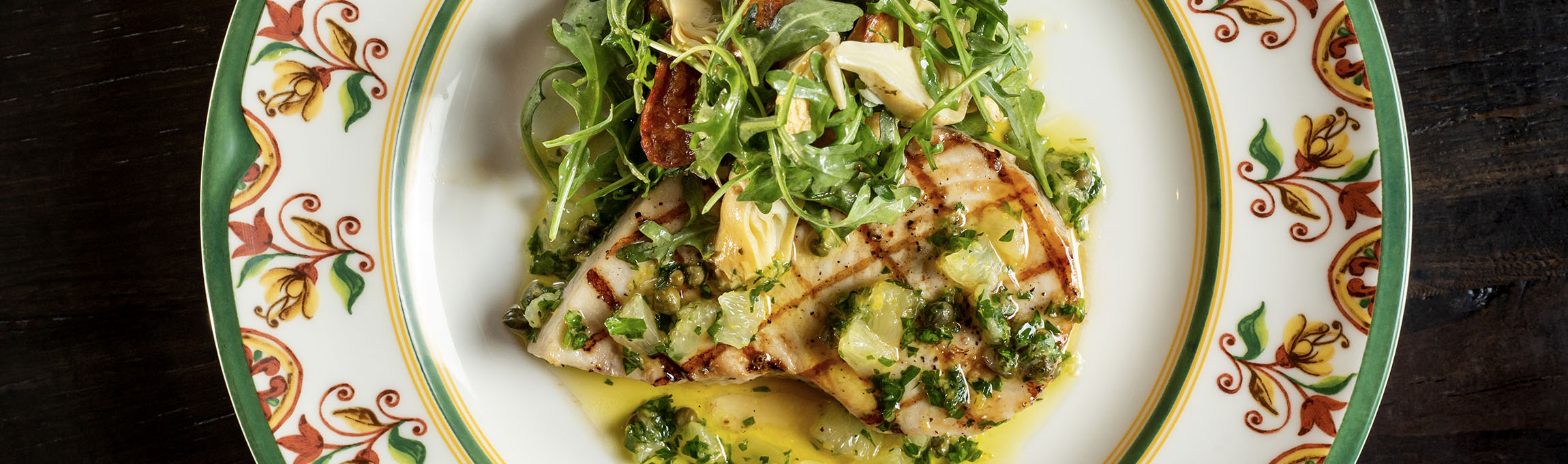 Grilled Swordfish with lemon caper gremolata, arugula, roasted potatoes and artichokes served at Valentina's at Bridge Park in Dublin, Ohio.